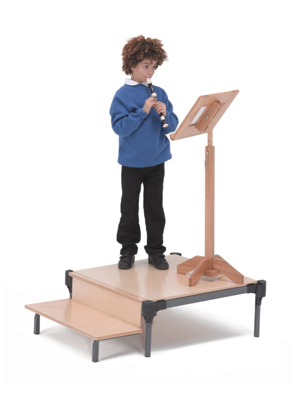Pupil standing on a Gratnells Stage product.